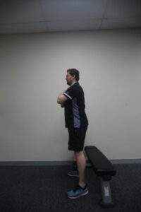 How to do a chair squat / box squat - step 1 side view