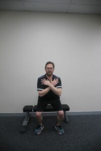 How to do a chair squat / box squat - step 2 front view